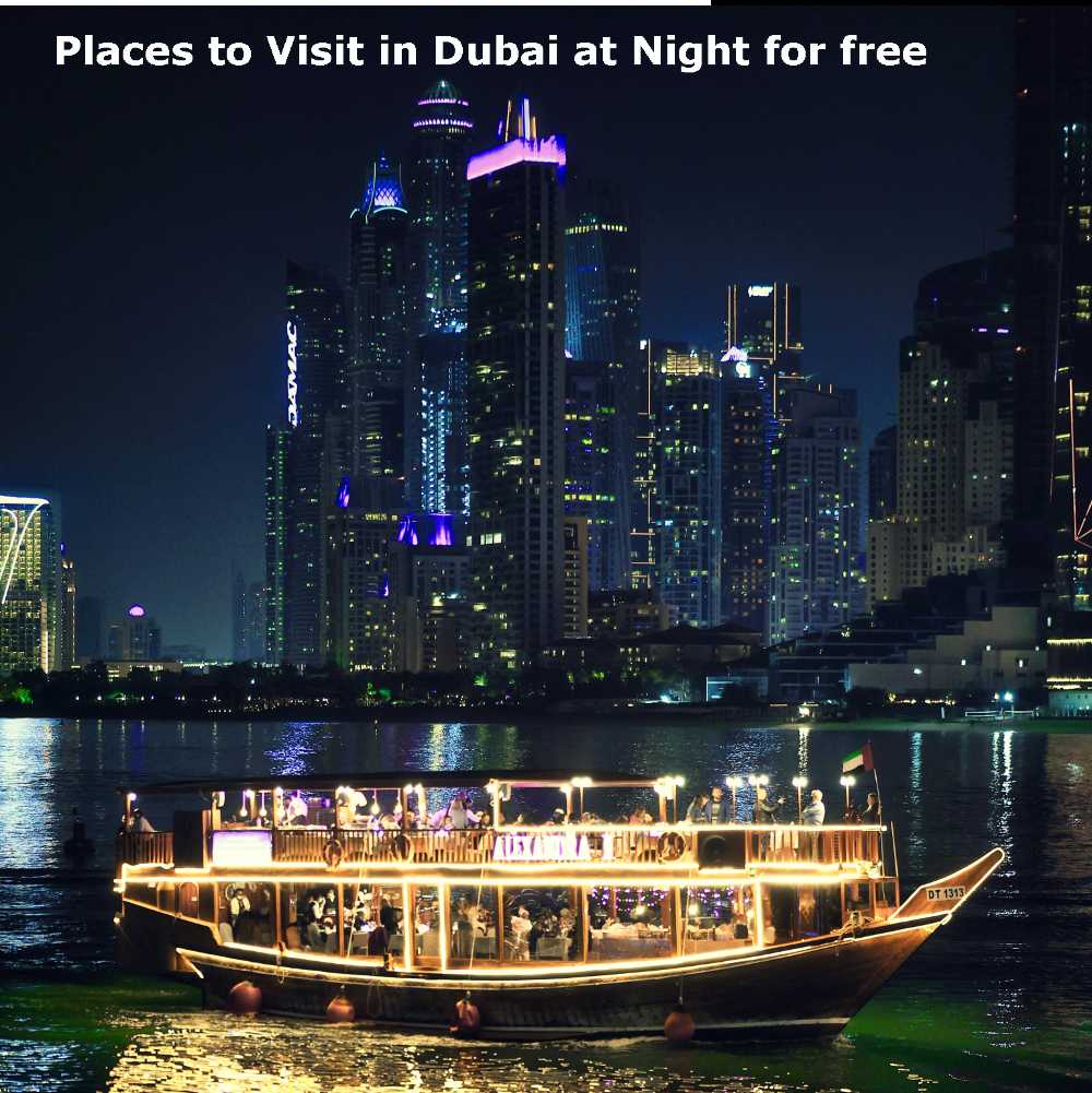 A boat on water at night, surrounded by skyscrapers, showcases a stunning place to visit in Dubai at night for free